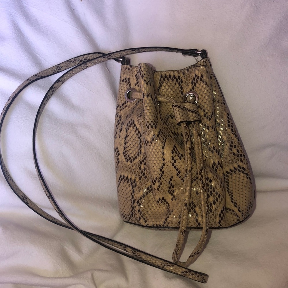 H&M brand snakeskin drawstring purse